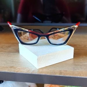 Moschino silver mirror lenses glasses. Very original and cool.